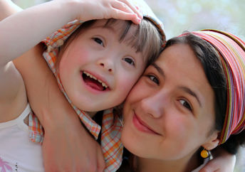 Happy family moments: Mother and child have fun.