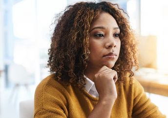 A woman deep in thought.