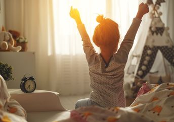 Waking up refreshed in the morning.