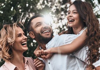 Happy family enjoying nature.