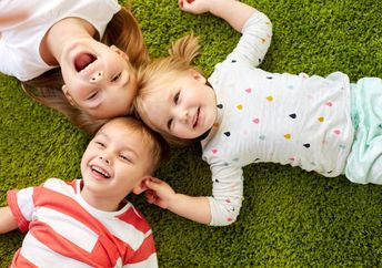 Siblings playing together.