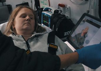 Using a sign language app in an ambulance.