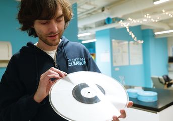 Making an album from captured plastic trash.