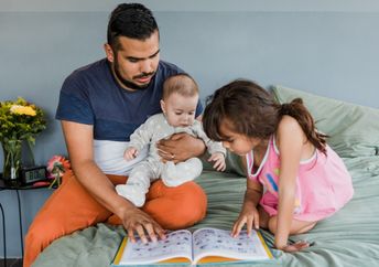 Father taking care of his children