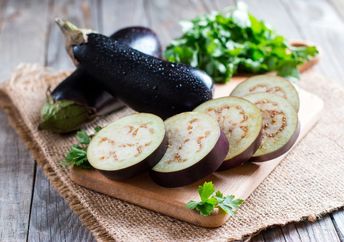 Slicing an aubergine.