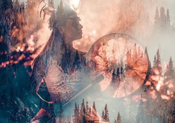 Shamanic playing on a frame drum for sound healing.