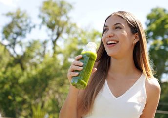 A woman detoxing and living a healthy lifestyle.