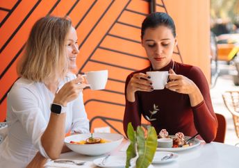 wo women having a serious conversation.