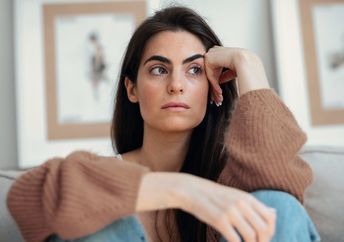 Woman lost in thought.