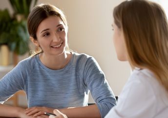 Two woman having a conversation.
