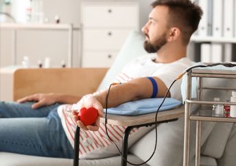 Man giving a blood donation.
