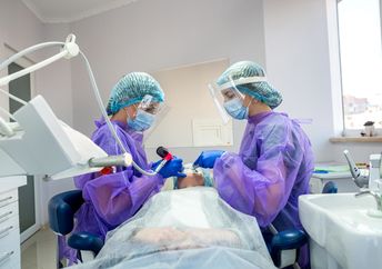 A patient being examined in a dental office.