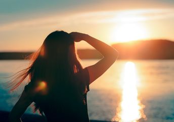 Hopeful woman looking towards the future.