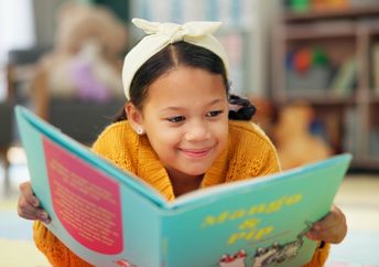Reading at the library.