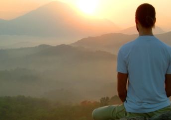 A man performing mindful meditation.