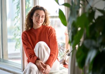 A woman content with the richness of her life.