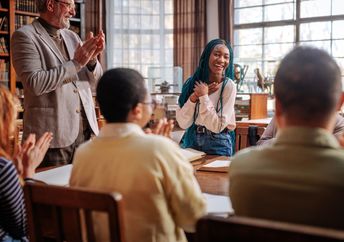 A class is in progress at a university.