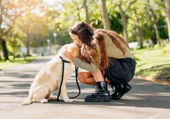 A woman with her dog.