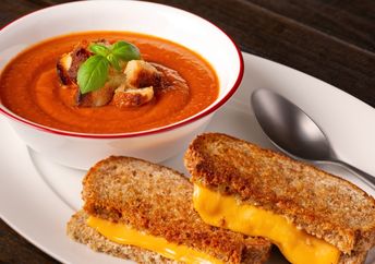 Nothing says comfort more than tomato soup and a vegan grilled cheese sandwich.