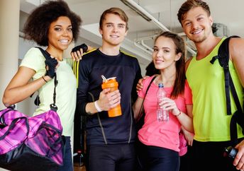 A group of friends in an aerobics class.