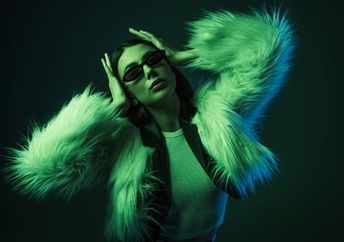 Young fashion fan in fake fur.