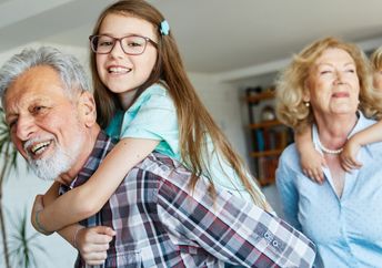 Grandparents watching their grandchildren.