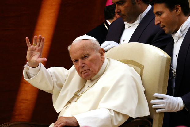 Pope John Paul II greets pilgrims in 2004