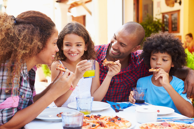Family eating pizza