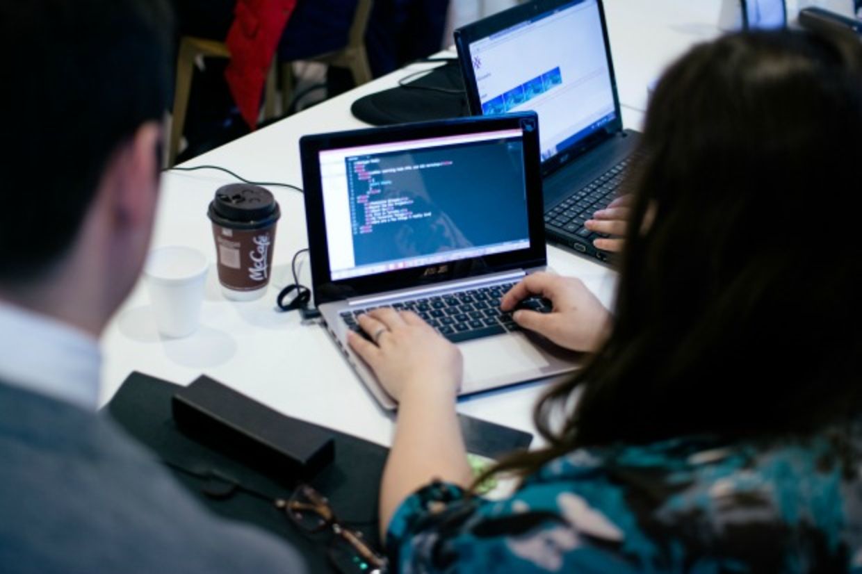 Ladies learning code during workshop
