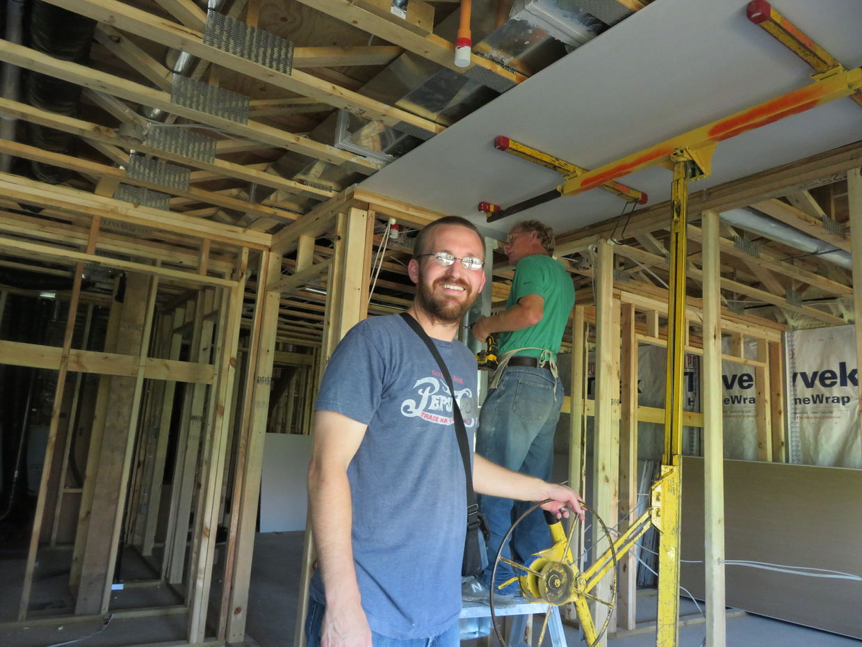 Co-founder Chris Zenner volunteering for Habitat for Humanity