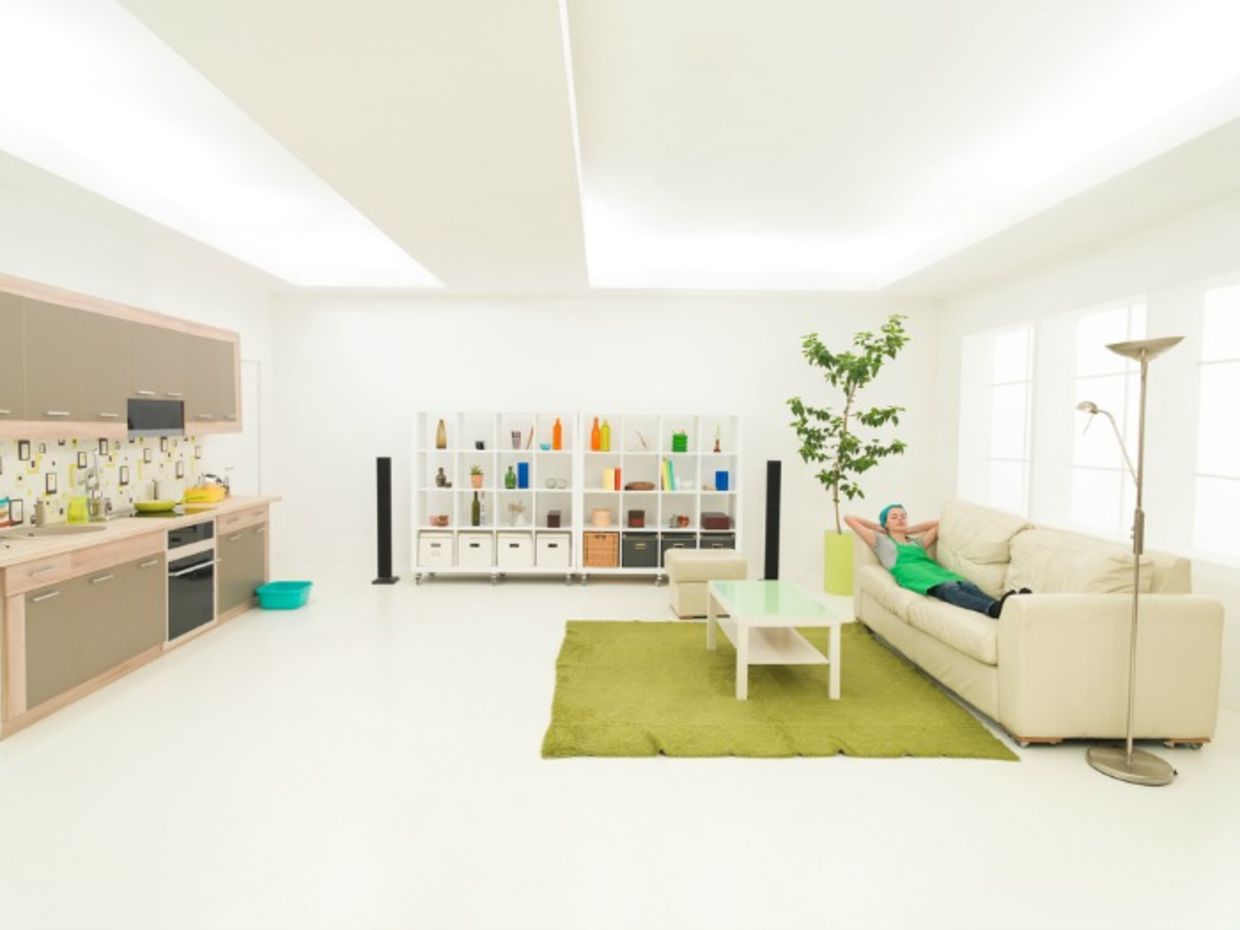 Woman relaxing after spring cleaning