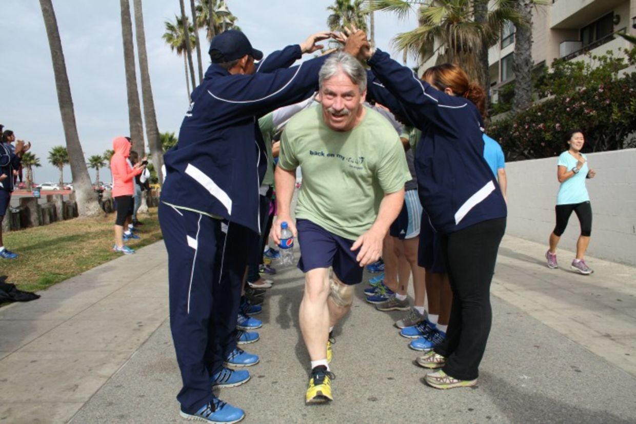 Member of Back on My Feet running