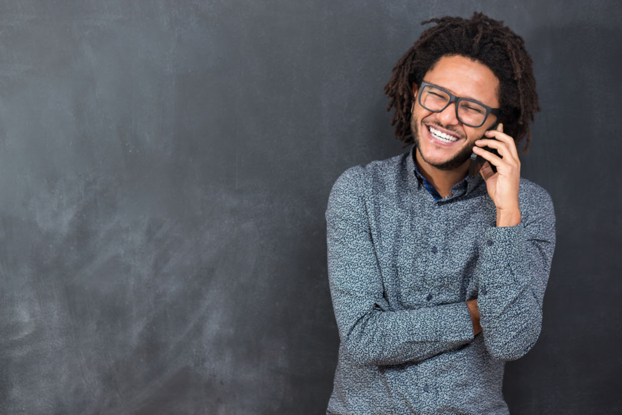 Happy man talking on the phone