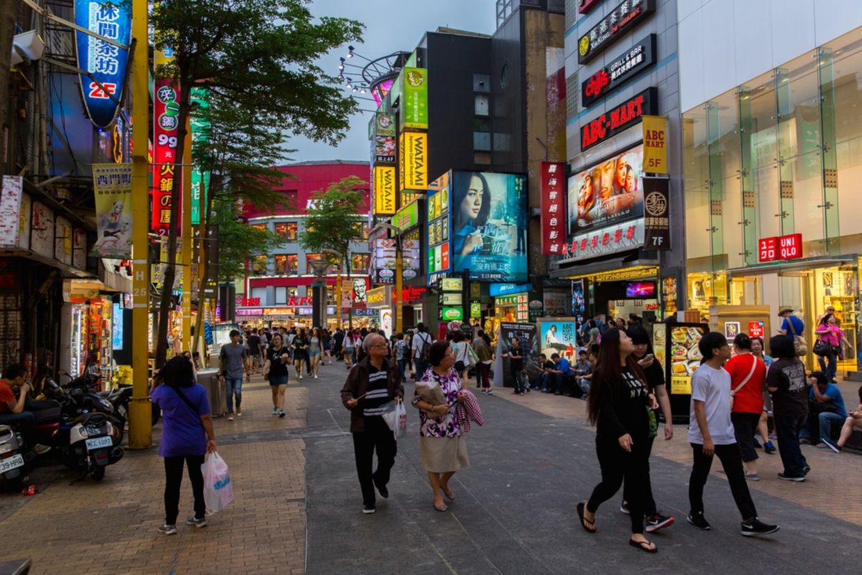 Locals and tourists walking at the Ximending street market in Taipei, Taiwan on May 4, 2016