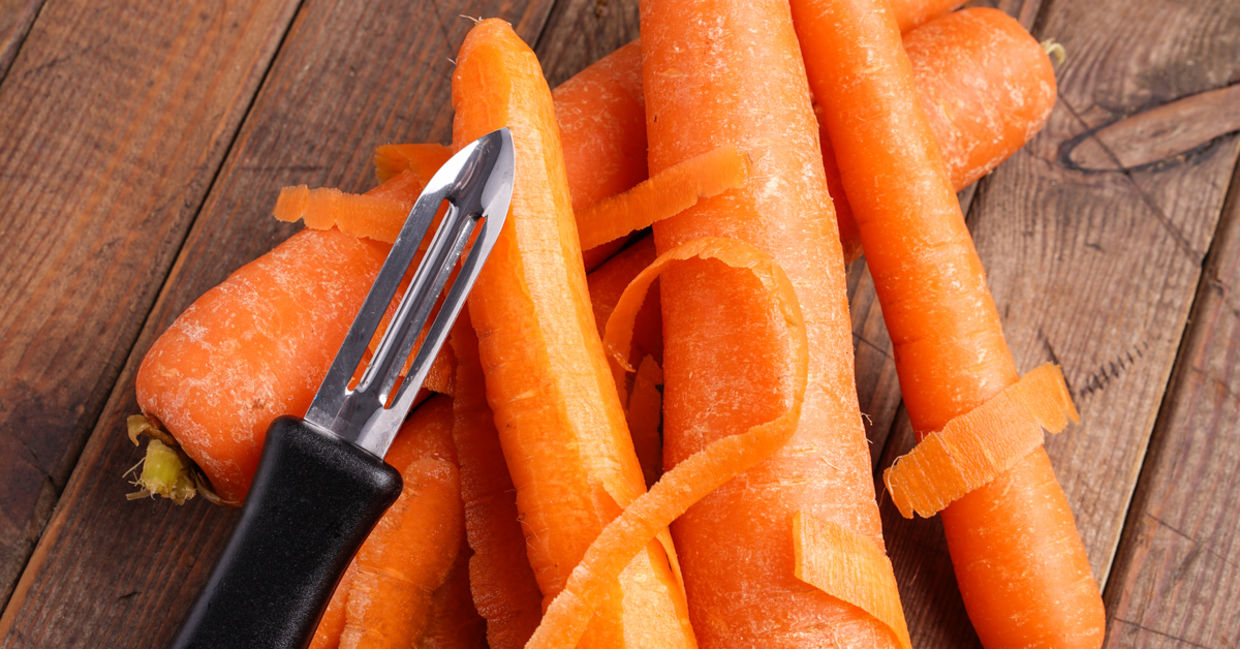 Peeling skins off to clean vegetables
