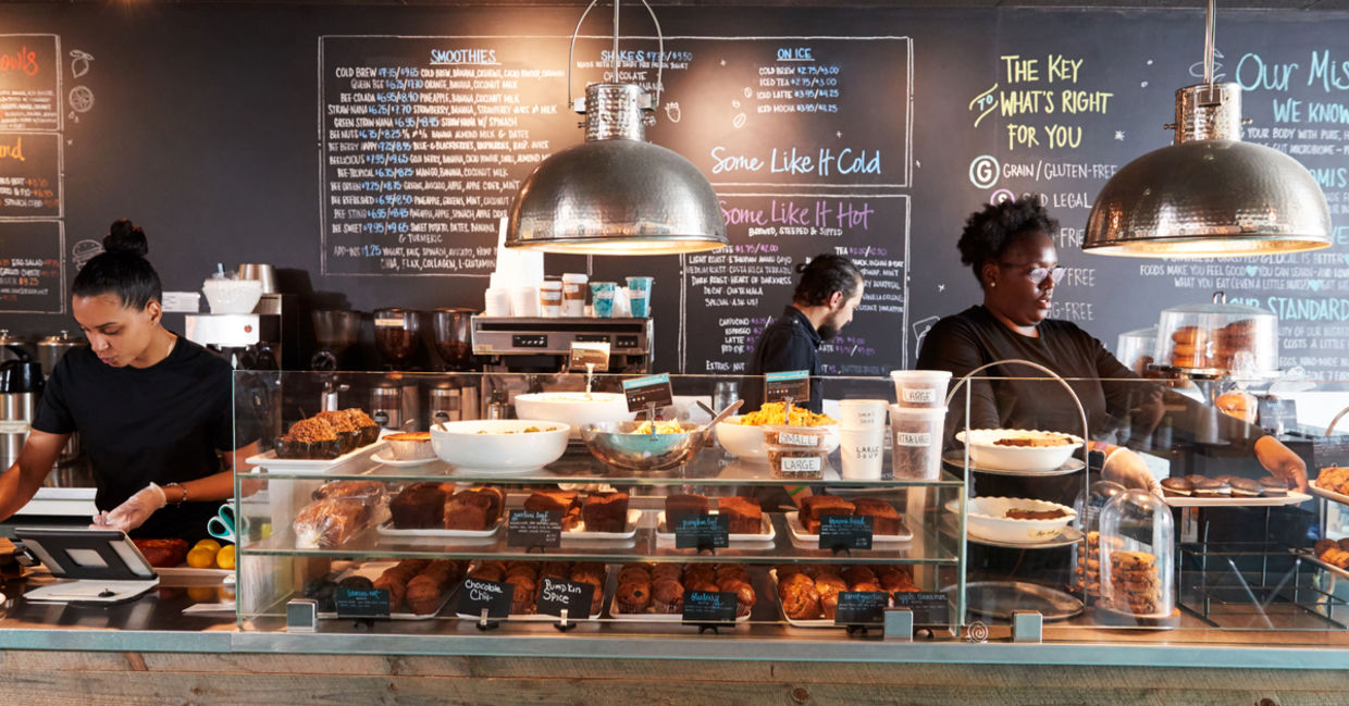 Freshly cooked dishes are presented at one of the locations of the Instock restaurant.