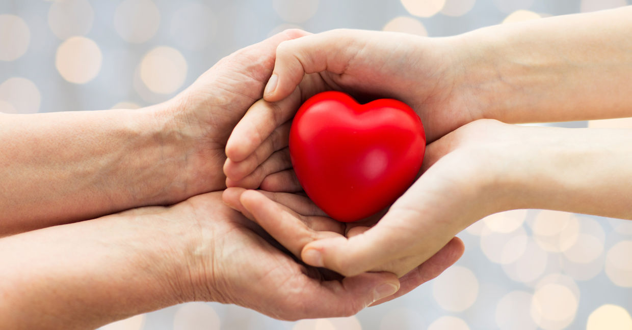 Hands holding a heart