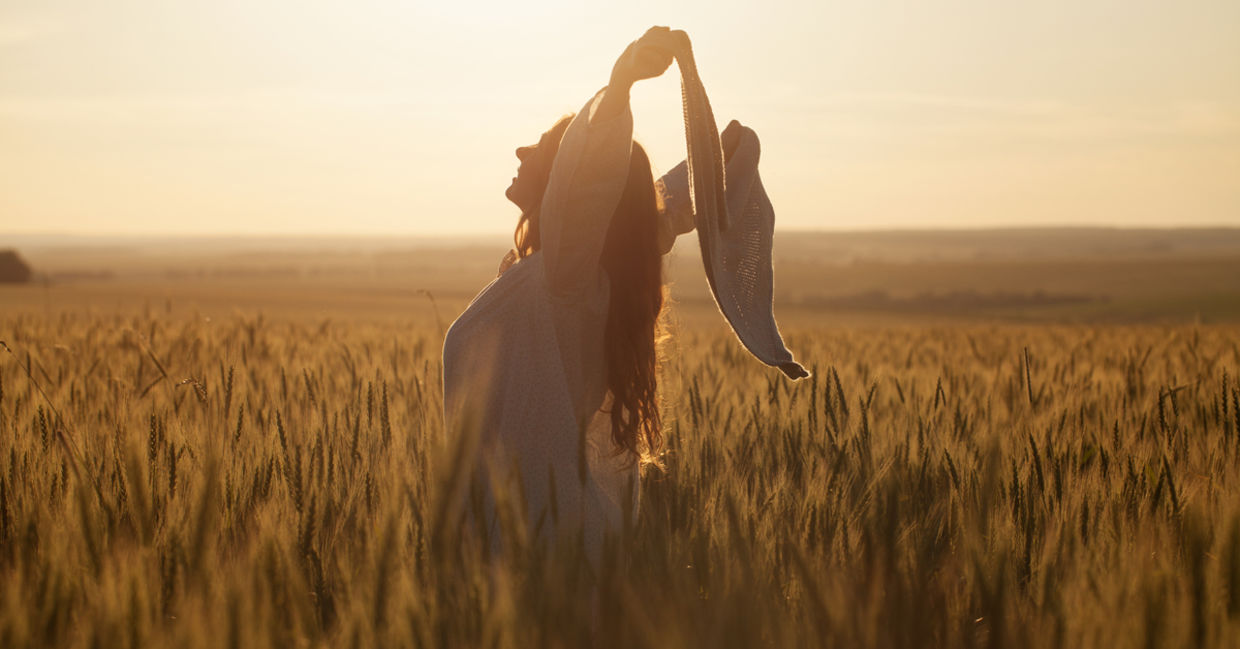 Happy woman in a field