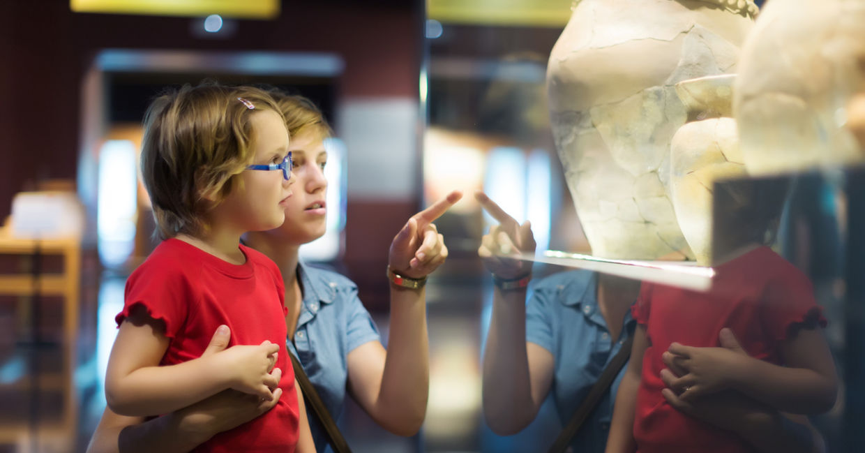Mother and daughter at a history museum.