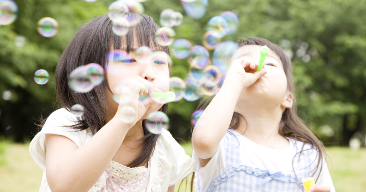 Kindergarteners  playing outside.