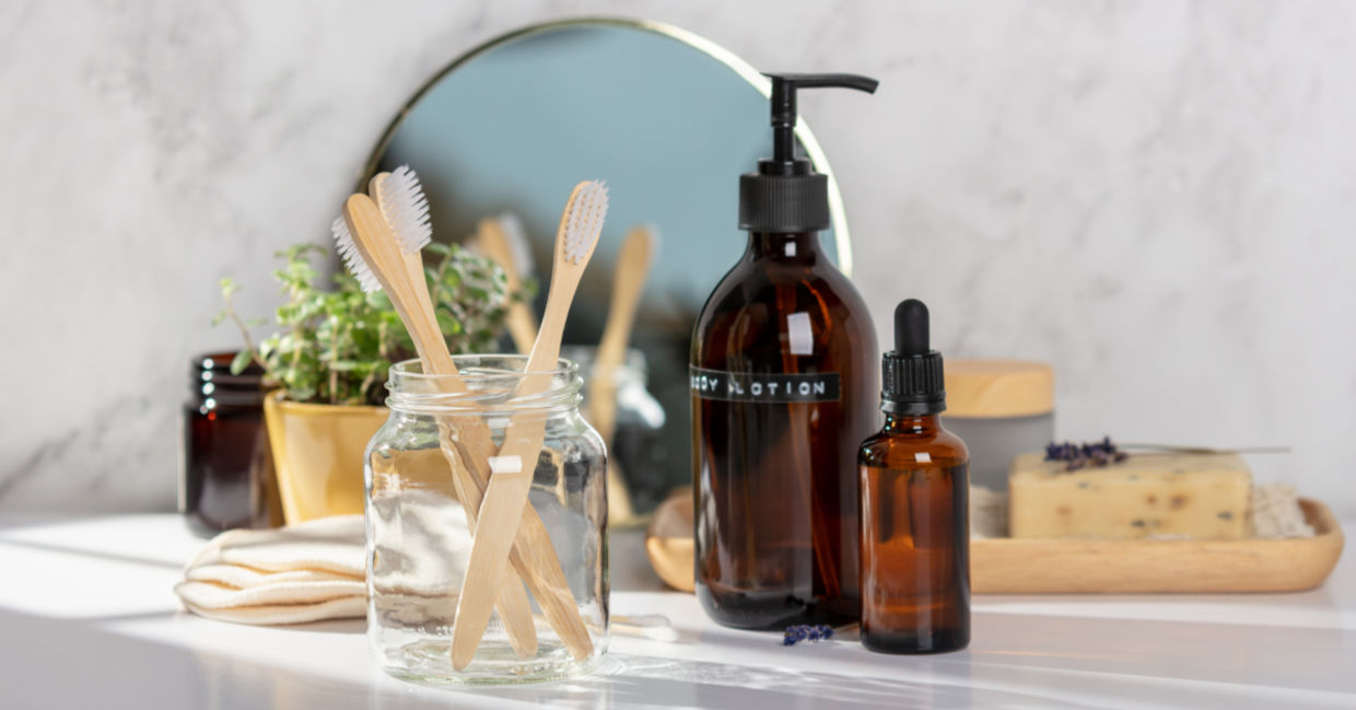 An eco-friendly bathroom with toothbrushes and DIY beauty products.
