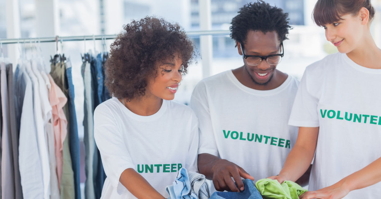 Volunteers taking clothing donations