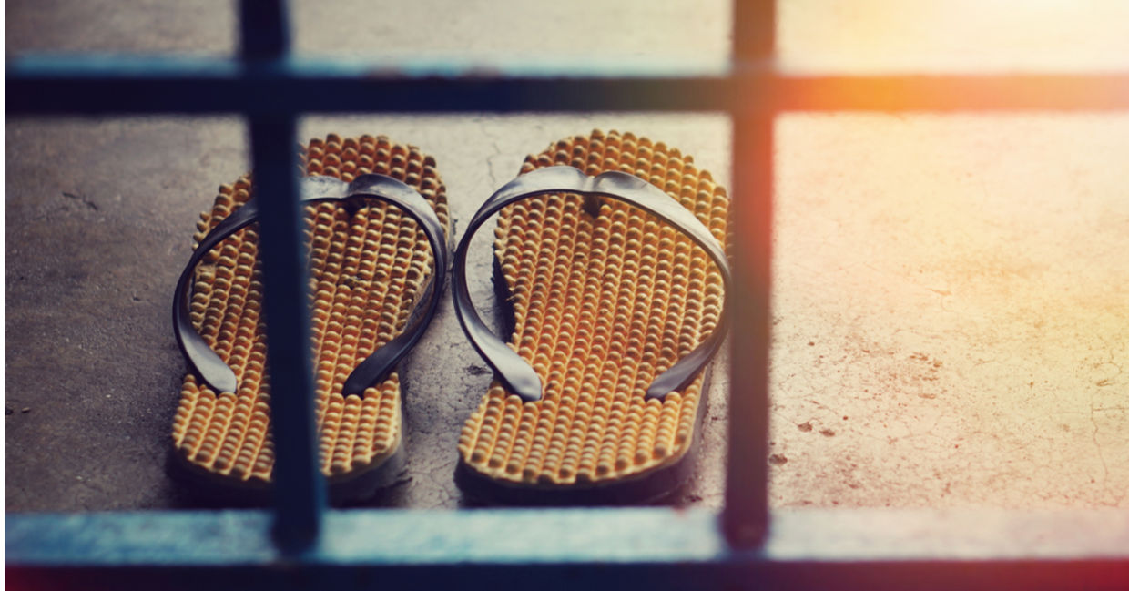 Shoes left outside a doorway in Japan.
