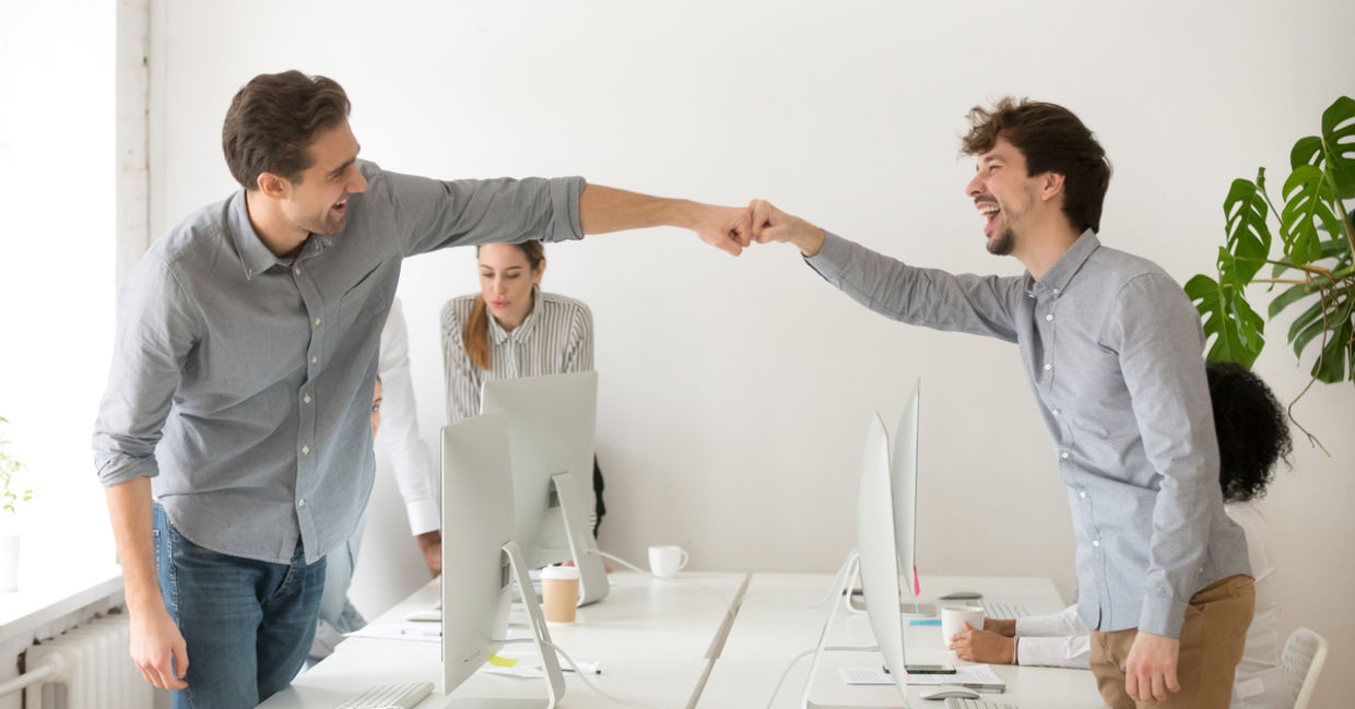 Colleagues congratulating each other