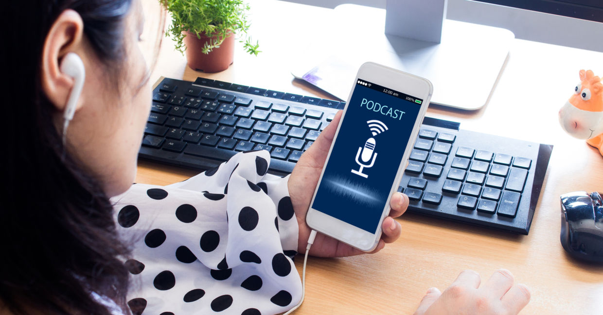 Woman listening to podcast