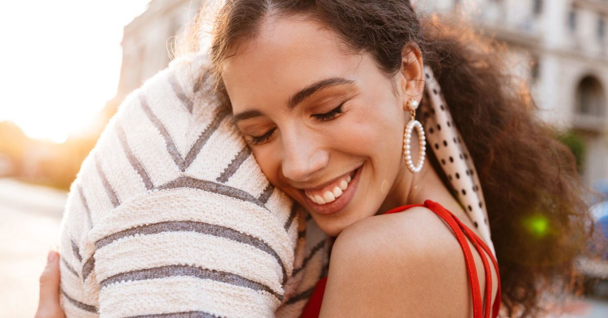 couple hugging outside