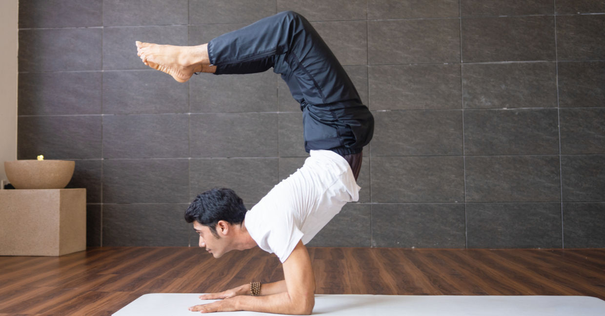 Man in the scorpion pose.