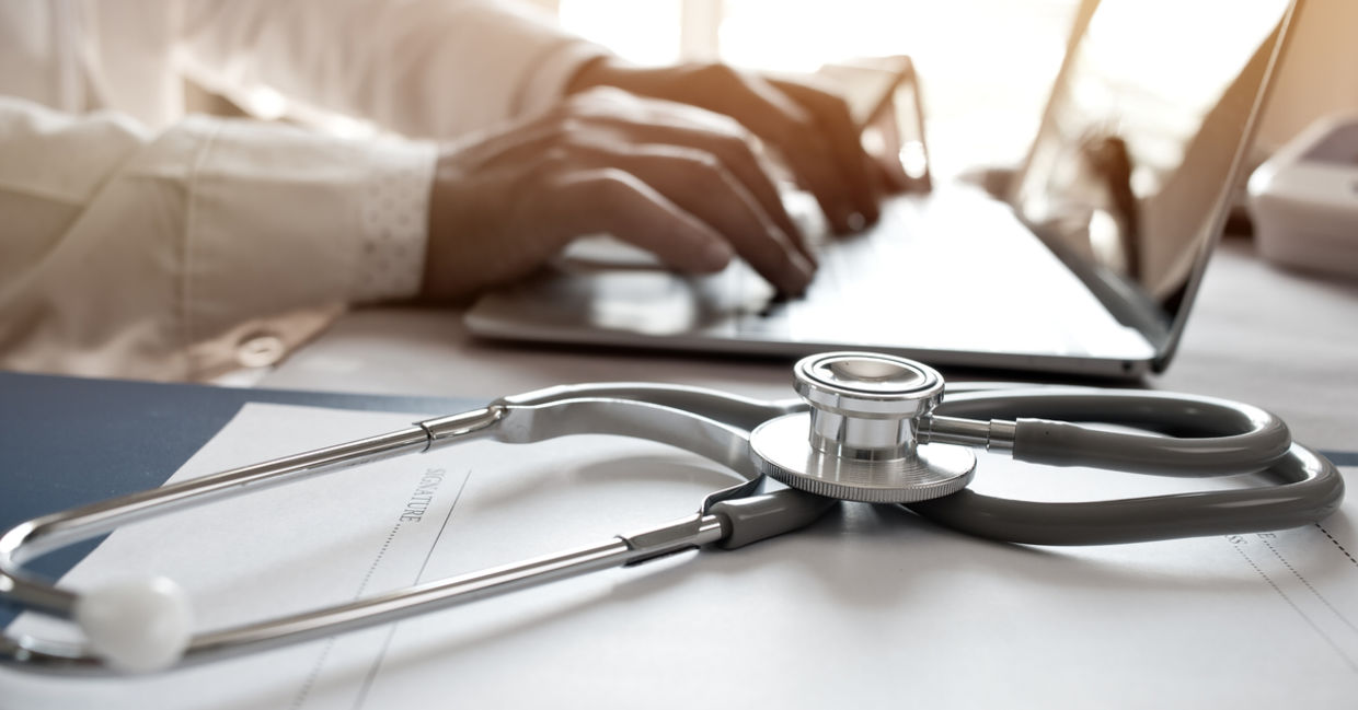 A stethoscope on a laptop