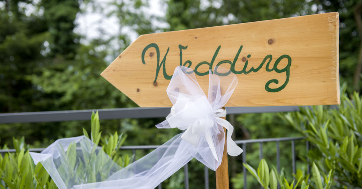 Outdoor wedding reception at a park.