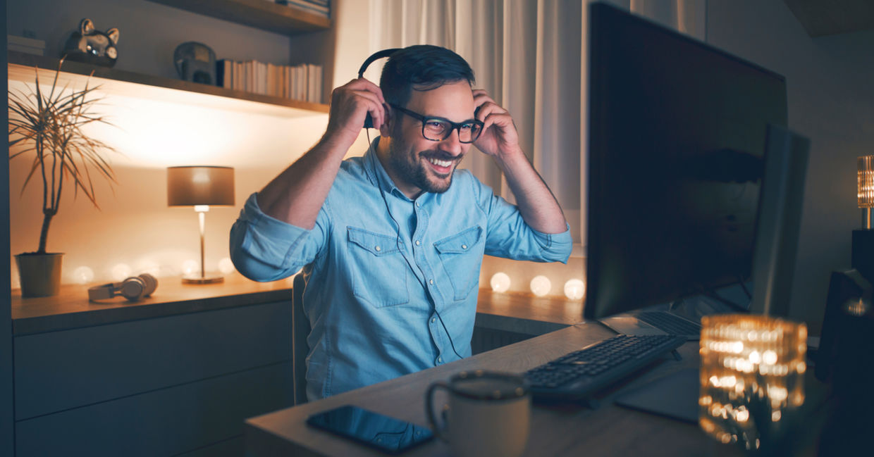 Man working in his home office after hours